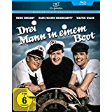 Drei Mann in einem Boot